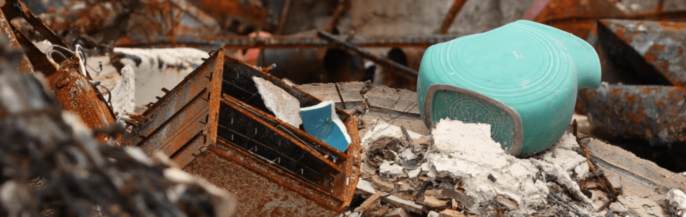 A damaged fiesta-ware carafe in the rubble of a burned out home in Paradise, California following the Camp Fire.